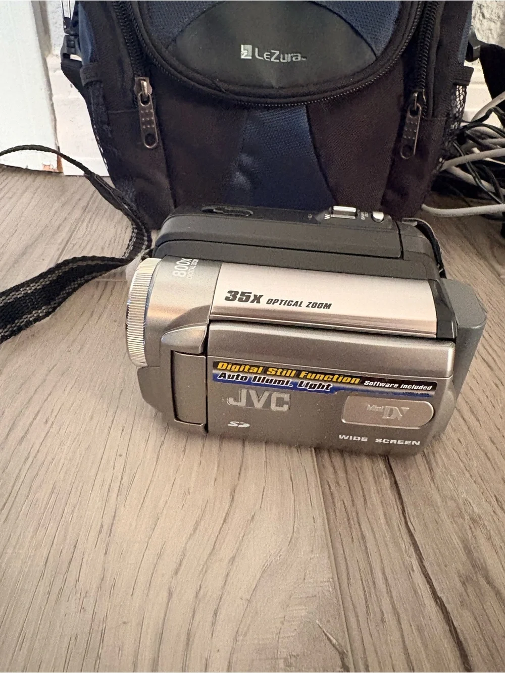 Silver Compact Camcorder with Blue LeZura Carry Case